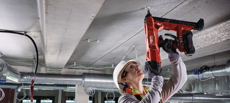 Akku-Bolzensetzgerät BX 4-ME-22 für Beton (Ausführung M&E) Nuron Akku-Setzgerät für die Installation von Kabeln, Rohren und Gewindebolzen in Beton, Stahl und Mauerwerk Anwendungen 1